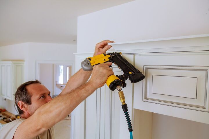 easily install crown molding on cabinets that go to the ceiling