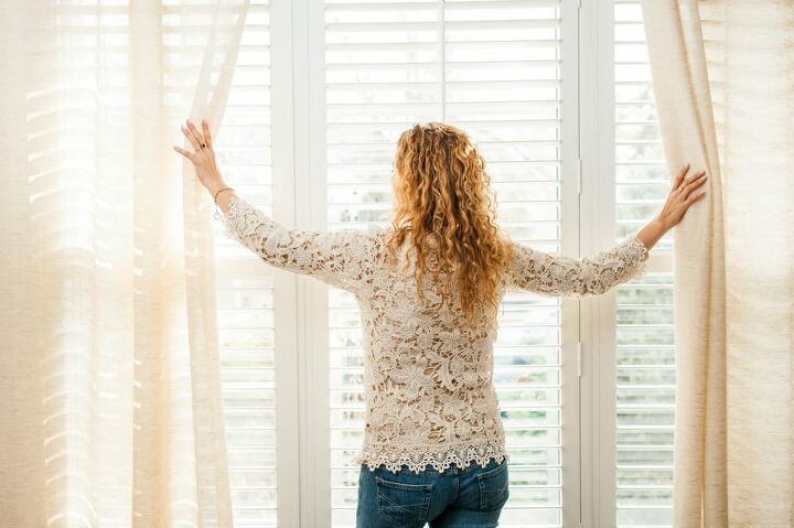 how to hang curtains over blinds that stick out