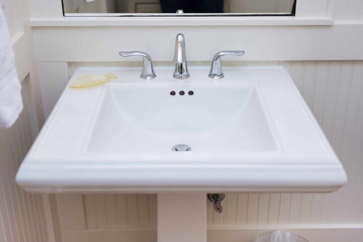 how to clean a pedestal sink overflow