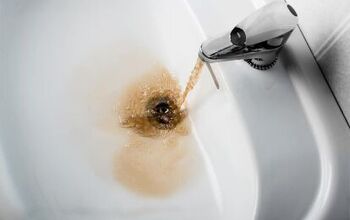 Burst Of Black Water From Faucet? (Possible Causes & Fixes)
