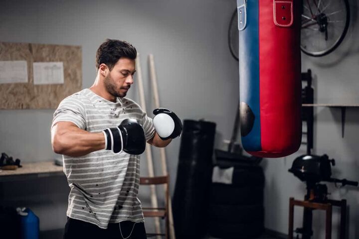 how to hang a punching bag in the garage quickly easily