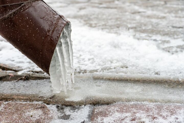 how to run a downspout under a sidewalk do this