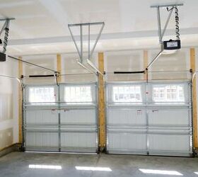 is your garage door crooked and stuck here s what you can do