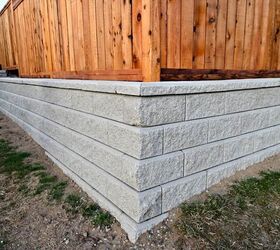 how to build a fence on top of a retaining wall do this