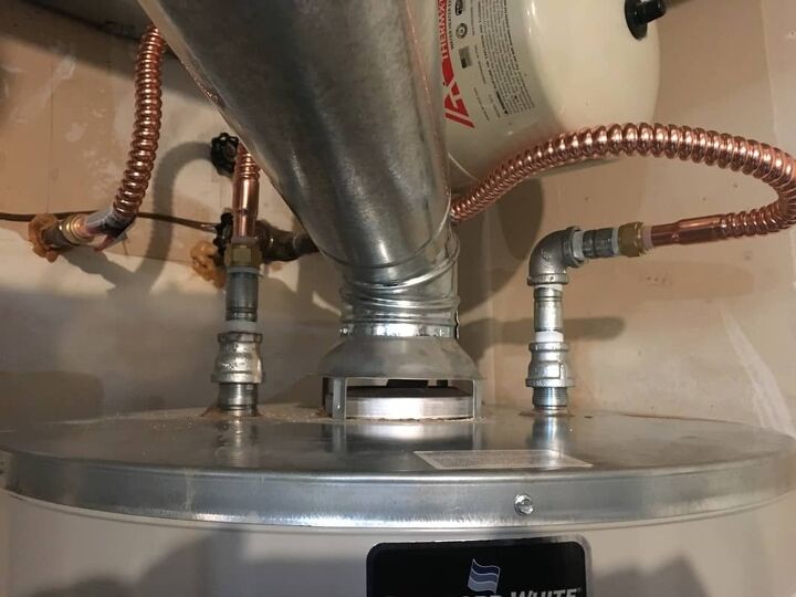 water heater leaking from drain pipe possible causes fixes