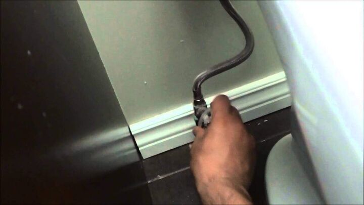 how to remove plastic nut from toilet tank do this