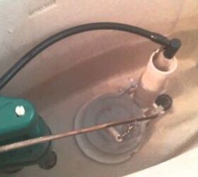 how to remove plastic nut from toilet tank do this