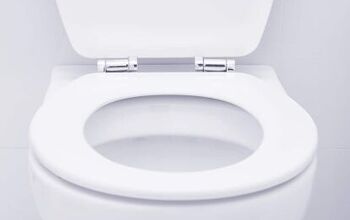 Toilet Fills Up With Water Then Drains Slowly? (Fix It Now!)