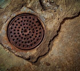 Basement Floor Drain Backs Up When Toilet is Flushed? (Fix It Now)