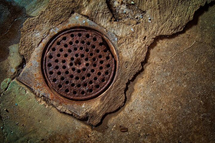 basement floor drain backs up when toilet is flushed fix it now