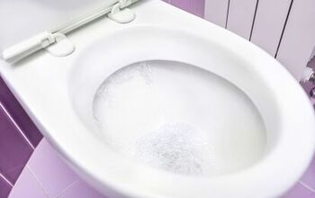 Why Does My Toilet Double Flush? (Possible Causes & Fixes)
