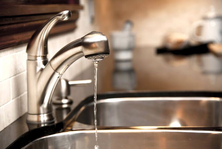 what causes low water pressure at a kitchen sink