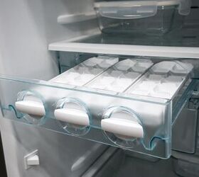 ice keeps getting stuck in ice maker possible causes fixes