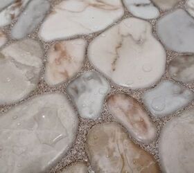 what are the pros and cons of pebble shower floors