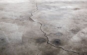 Garage Floor Cracked And Is Sinking? (Here's What You Can Do)
