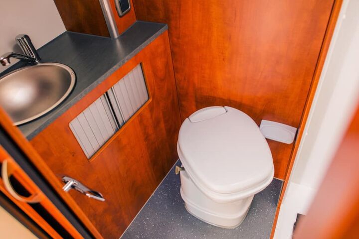 rv toilet leaking on floor possible causes fixes